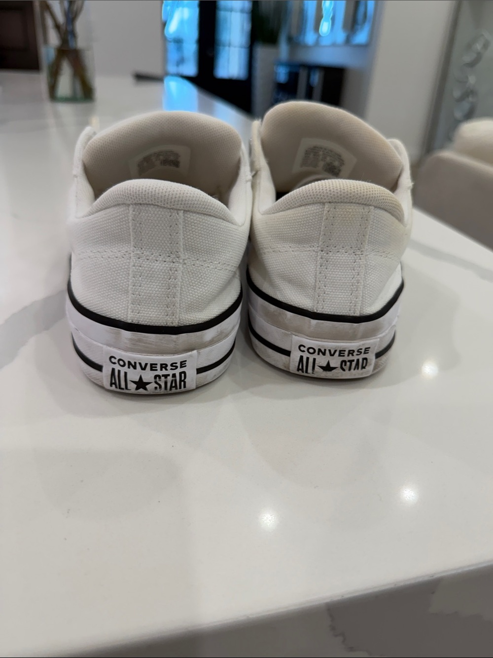 Converse White Low-Top Slip-On Canvas Sneakers with Black Trim - Picture 5 of 10